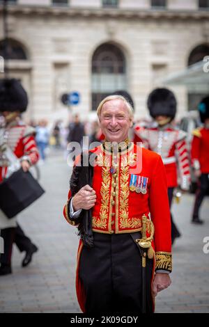 Member of Accession Council stands next to a Rolls Royce outside the Royal Exchange in the City of London, after the reading of the Proclamation of Accession of King Charles III at Picture date: Saturday September 10, 2022: Photo Horst A. Friedrichs Alamy Live News Stock Photo