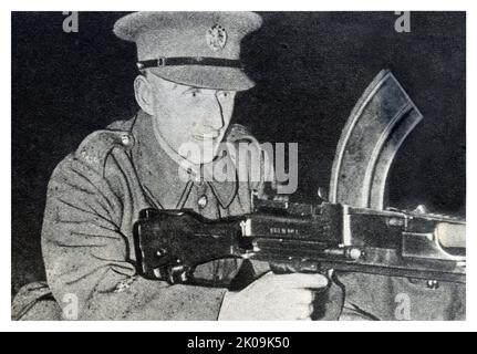 A Bren gunner during World War II. The Bren gun was a series of light machine guns (LMG) made by Britain in the 1930s and used in various roles until 1992. Stock Photo