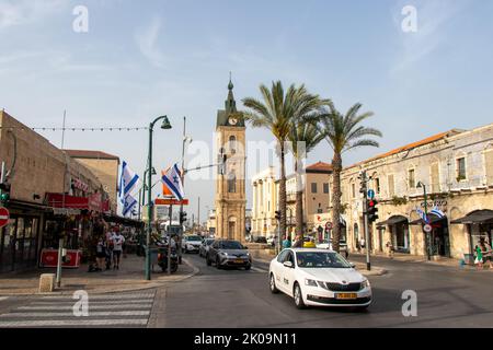Tel Aviv, Israel: 24 April 2022. View of Yefet street and Clock Tower in the old Jaffa. Stock Photo