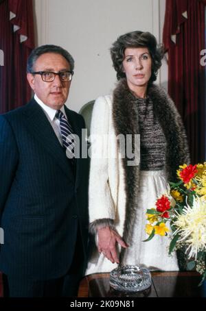 Nancy and Henry Kissinger. Henry Kissinger; American politician, diplomat, and geopolitical consultant who served as United States Secretary of State and National Security Advisor under the presidential administrations of Richard Nixon and Gerald Ford. Stock Photo