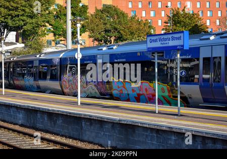 Northern Ireland Railways train with graffiti Stock Photo