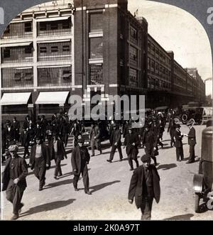 Employees leaving the Ford Motor Company factory at Detroit, Michigan. Keystone View Company., c1916 Stock Photo