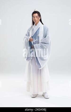 Young Chinese man in ancient costume Stock Photo