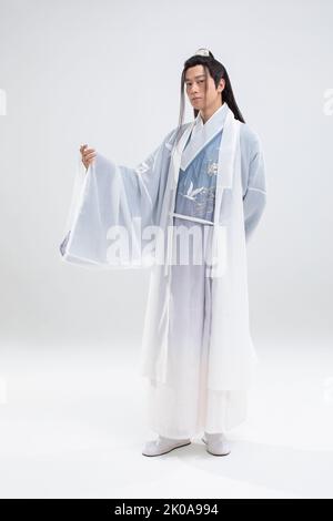 Young Chinese man in ancient costume Stock Photo