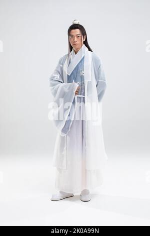 Young Chinese man in ancient costume Stock Photo