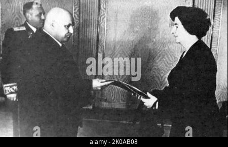 Golda Meir, Israel's minister plenipotentiary to the Soviet Union, presenting her credentials to Vaslov, deputy chairman of the Supreme Soviet, 1948. Golda Meir (born Golda Mabovitch; May 3, 1898 - December 8, 1978; married name Meyerson/Myerson between 1917-1956) was an Israeli politician, teacher, who served as the fourth prime minister of Israel from 1969 to 1974. She was the first woman to become head of government in Israel Stock Photo