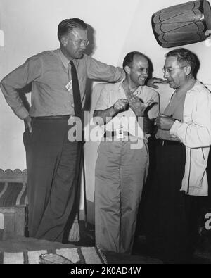 Atomic physicists Ernest O. Lawrence, Enrico Fermi, and Isidor Rabi 1958. Ernest Orlando Lawrence (August 8, 1901 - August 27, 1958) was a pioneering American nuclear scientist and winner of the Nobel Prize in Physics in 1939 for his invention of the cyclotron. Enrico Fermi (29 September 1901 - 28 November 1954) was an Italian (later naturalized American) physicist and the creator of the world's first nuclear reactor, the Chicago Pile-1. Isidor Isaac Rabi (July 29, 1898 - January 11, 1988) was an American physicist who won the Nobel Prize in Physics in 1944 for his discovery of nuclear magneti Stock Photo