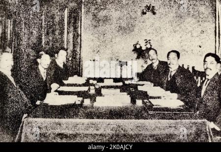 On January 18, 1915, Japan took advantage of the time when European and American imperialists had no time to look east in the First World War, and presented to Yuan Shikai's government a secret document aimed at destroying China -- the 'Japan-China Treaty'. The full text consists of twenty-one demands, so this treaty is usually called 'Twenty-One'. Pictured is the scene when the treaty is signed. Stock Photo