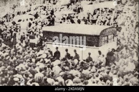 Masses along the way welcomed protesters who are protesting against the American army's violent acts. Stock Photo