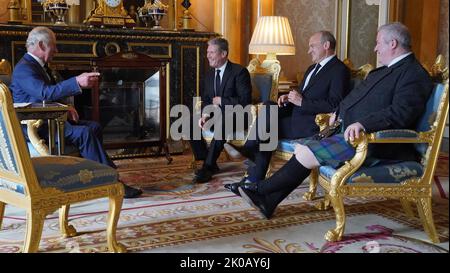 London, UK. 11th Sep, 2022. Britain's King Charles III (L) speaks with Britain's Labour party leader Keir Starmer (C), Liberal Democrat leader Ed Davey (2nd R) and SNP Westminster leader Ian Blackford (R) during an audience, at Buckingham Palace, in London, on Saturday on September 10, 2022. King Charles III pledged to follow his mother's example of 'lifelong service' in his inaugural address to Britain and the Commonwealth on Friday, after ascending to the throne following the death of Queen Elizabeth II on September 8. Photo by The Royal Family/ Credit: UPI/Alamy Live News