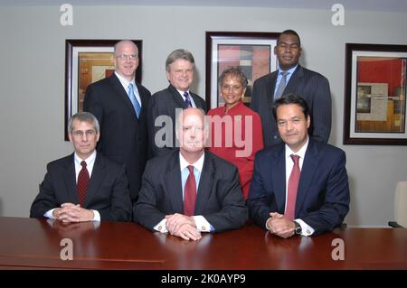 Ginnie Mae Group Portrait - Group portrait: Government National Mortgage Association (Ginnie Mae) President Robert Couch with other Ginnie Mae officials. Ginnie Mae Group Portrait Subject, Group portrait: Government National Mortgage Association (Ginnie Mae) President Robert Couch with other Ginnie Mae officials. Stock Photo