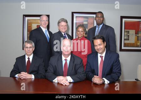 Ginnie Mae Group Portrait - Group portrait: Government National Mortgage Association (Ginnie Mae) President Robert Couch with other Ginnie Mae officials. Ginnie Mae Group Portrait Subject, Group portrait: Government National Mortgage Association (Ginnie Mae) President Robert Couch with other Ginnie Mae officials. Stock Photo