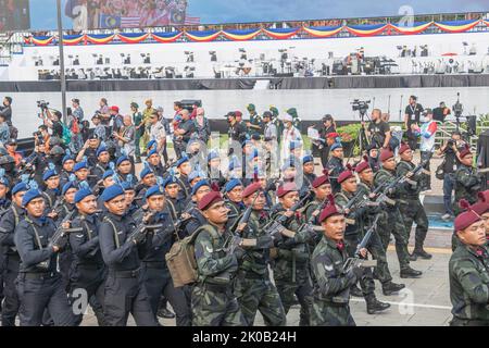 Troop from Special Operation Command in maroon beret, and Marine Assault Team in blue beret of Malaysian Police during 65th Malaysia National Day. Stock Photo