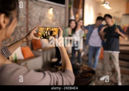 Happy Chinese friends having fun together Stock Photo