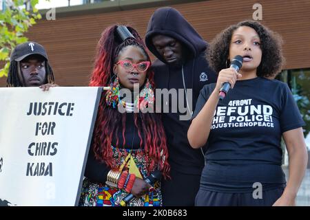 London, UK. 10th September, 2022. Singer Stormzy stands with activists Marvina Newton (L) and Temi Mwale (R). Hundreds of Black Lives Matters protesters listen to speakers outside New Scotland Yard. The demonstrators marched from Parliament Square to the police HQ calling for justice following a fatal police shooting of father-to-be Chris Kaba, an unarmed black man, last Monday in south London.  The IOPC are treating the investigation as homicide. Credit: Eleventh Hour Photography/Alamy Live News Stock Photo