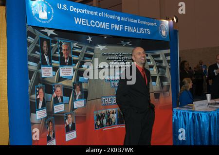 HUD Displays, Staff at Job Fair - HUD representatives, displays, promotions for Presidential Management Fellows (PMF) Program at Job Fair, Washington, D.C. Convention Center. HUD Displays, Staff at Job Fair Subject, HUD representatives, displays, promotions for Presidential Management Fellows (PMF) Program at Job Fair, Washington, D.C. Convention Center. Stock Photo