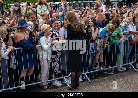 Windsor, UK. 10th September, 2022. Catherine, the new Princess of Wales, greets well-wishers outside Windsor Castle. Crowds gathered to pay tribute to Queen Elizabeth II, the UK's longest-serving monarch, who died at Balmoral aged 96 on 8th September 2022 after a reign lasting 70 years. Credit: Mark Kerrison/Alamy Live News Stock Photo