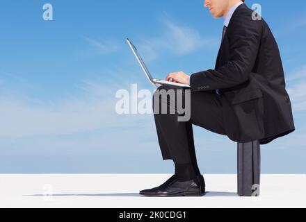 Business executive using a laptop with copyspace. Cropped image of a business executive using a laptop with copyspace. Stock Photo