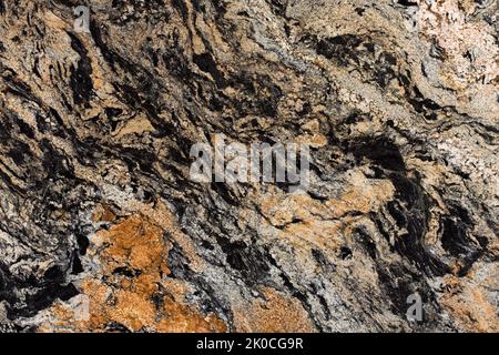 Magma gold natural granite stone texture, photo of slab. oft matt Italian stone texture for interior, exterior home decoration, floor tiles and Stock Photo