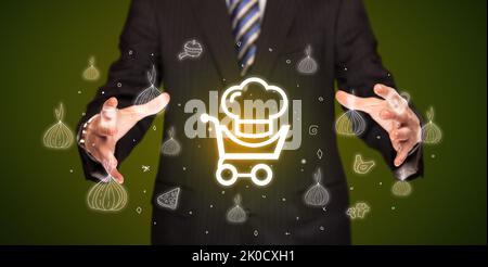 Hand holding food related icons Stock Photo