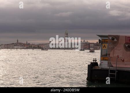 Venice, Italy - April, 21: View of the St Mark's Campanile on the cloudy sky on April 21, 2022 Stock Photo