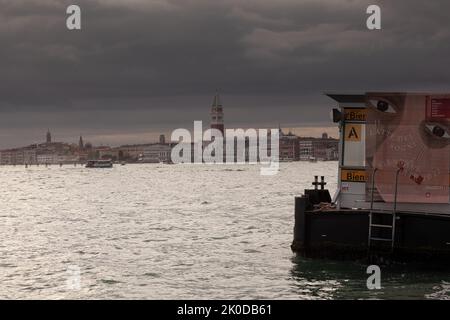 Venice, Italy - April, 21: View of the St Mark's Campanile on the cloudy sky on April 21, 2022 Stock Photo