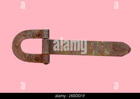 rusty metal door hinge. Door hinge isolated on pink background Stock Photo