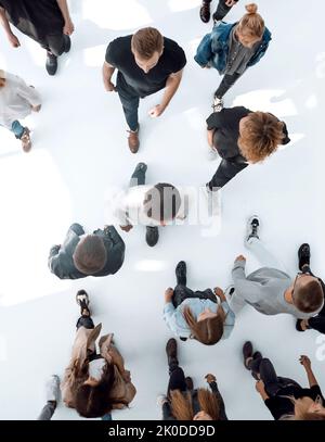 top view .groups of diverse young people moving towards each other Stock Photo