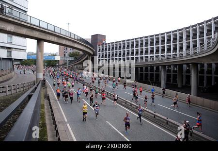Runners head through Newcastle during the Great North Run through Newcastle upon Tyne, Gateshead and South Shields. Picture date: Sunday September 11, 2022. Stock Photo