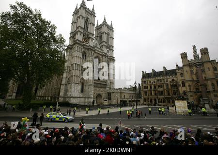 File photo dated 29/04/11 of crowds gather outside Westminster Abbey in London, ahead of the wedding between Prince William and Kate Middleton as the Queen's funeral venue is where she was married and crowned. The monarch had close connections to the church - a focal point during times of national celebration and sadness. The Queen was married and crowned at Westminster Abbey. Now the bells of the 'House of Kings' - half muffled in mourning - will ring out at her funeral. It will be the first time in over 260 years a sovereign's funeral has taken place in the Abbey. The last was George II's in Stock Photo