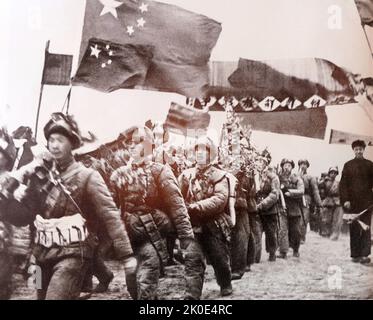 Chinese forces entering the Korean War, between North Korea and South Korea from 25 June 1950 to 27 July 1953. It began as an attempt by North Korean supreme leader Kim Il-sung to unify Korea under his communist regime through military force. Two powers entered the war, with the United States under President Truman fighting alongside the South and the newly established People's Republic of China fighting alongside the North. Stock Photo