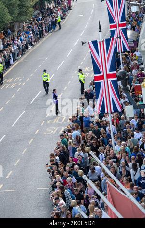 Windsor, Berkshire, UK. 11th September, 2022. Following the sad passing of Queen Elizabeth II, the Proclamation of King Charles III was read out by the Mayor of the Royal Borough of Windsor and Maidenhead this morning outside Windsor Castle. The streets were crowded with people watching this historic moment of history. The National Anthem was played and people cheered for the new Monarch. Credit: Maureen McLean/Alamy Live News Stock Photo