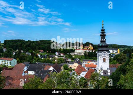 Beautiful aerial view of Ehrenhausen town with the clock tower of the Catholic pilgrimage church in foreground, Leibnitz, south Styria, Austria Stock Photo