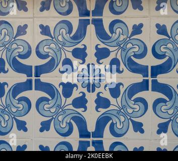 Blue ceramic tiles from facade of old houses in Lisbon Portugal. Portuguese traditional Azulejos decorative artistic design background, creative Stock Photo