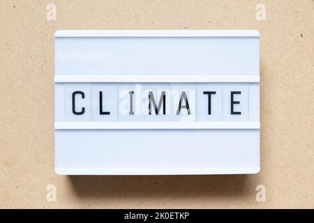 Lightbox with word climate on wood background Stock Photo