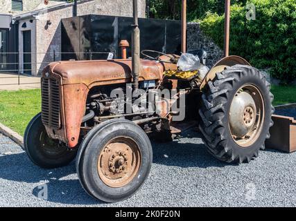 An old vintage Massey Ferguson tractor, still working, in Strokestown Park. County Roscommon, Ireland. Stock Photo