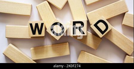 The WORD is written on wooden cubes. Word concept Stock Photo