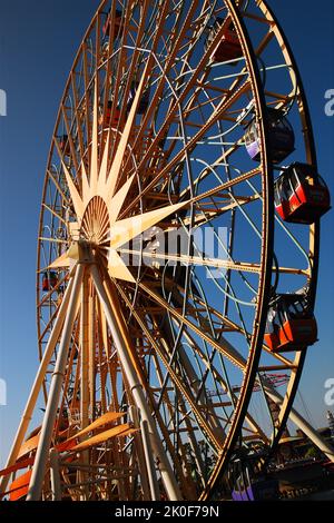 A large Ferris wheel extends to the sky oat Disneyland's California Adventure in Anaheim Stock Photo