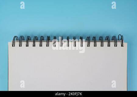 a notebook with a spiral and blank sheets Stock Photo