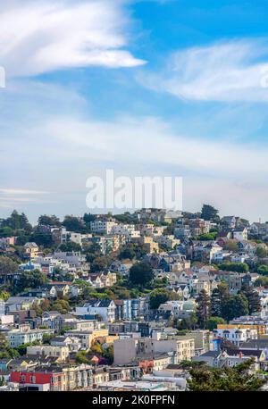 Townhouses on a sloped land area in San Francisco, California. Row of ...