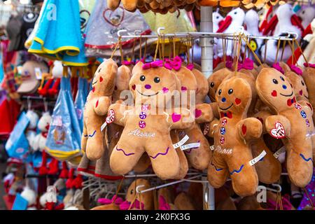 Plush souvenir toys of gingerbread cookie men at a shop in Colmar, Alsace, France Stock Photo