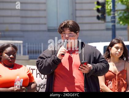 San Francisco, CA - June 11, 2022: Cal Kinoshita, student youth organizer, speaking at Gun Violence Protest Rally in front of City Hall. Stock Photo