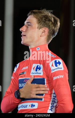 Madrid, Spain. 11th Sep, 2022. Remco Evenepoel of Belgium and Team Quick-Step - Alpha Vinyl celebrates winning the Red Leader Jersey on the podium ceremony after the 77th Tour of Spain 2022. Belgian rider Remco Evenepoel claimed his first Grand Tour victory in the Vuelta a Espana in Madrid. The 22-year-old dominated the three-week race, taking victory after the 21st. Credit: SOPA Images Limited/Alamy Live News Stock Photo