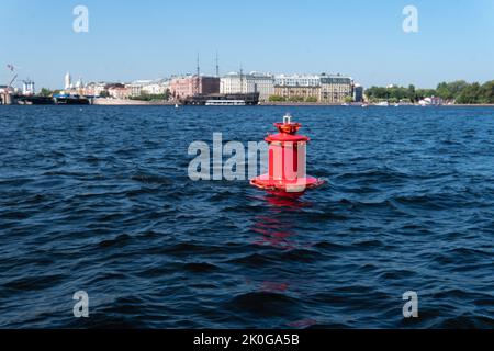 RUSSIA, PETERSBURG - AUG 20, 2022: buoy float ocean red waves bay object nature summer, concept frigate street for tower from city fort, history Stock Photo