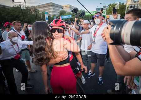 Remco Evenepoel and his partner Oumaima Oumi Rayane celebrate after winning the final stage of the 2022 edition of the 'Vuelta a Espana', Tour of Spain cycling race, in Madrid, Spain, Sunday 11 September 2022. BELGA PHOTO DAVID PINTENS Stock Photo
