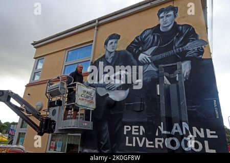 New Paul Curtis artist mural painting on gable end of the Penny Lane Development Trust, Liverpool, L18 John Lennon & Paul McCartney of the Beatles Stock Photo
