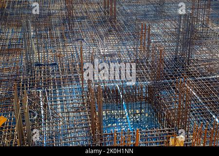 Billets of reinforcement at the construction site. New construction. Reinforced concrete construction. Stock Photo
