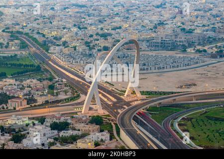 Al Wahda Bridge The Tallest Monument of City. known as 56 Bridge of Arch Doha City Stock Photo