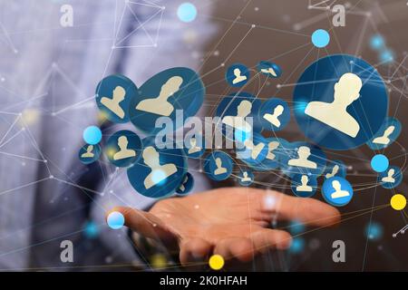 A group of 3D rendered profile icons hovering over a man's hand Stock Photo