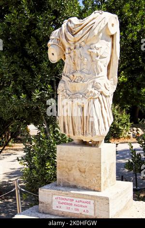 A vertical shot of a headless statue in the Palace of the Giants, Ancient Agora of Athens, Greece Stock Photo